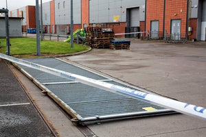 Man Killed by Falling Gate in Workplace